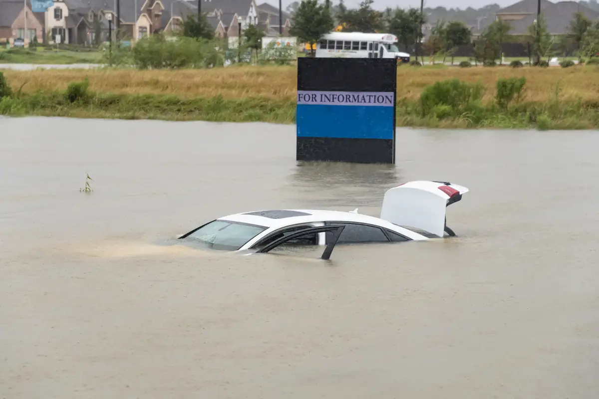 Sell a flood-damaged car in Houston: sedan swamped by floodwater in humble Sedan swamped by floodwater in Humble, Texas, after Hurricane Harvey, a car its owner may need to sell as a flood-damaged car in Houston