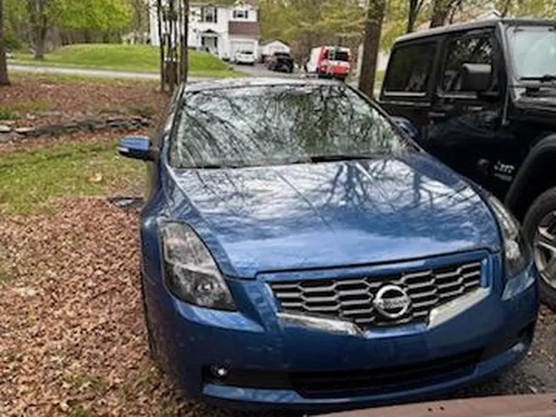 2009 Nissan Altima 3.5SE sold for cash to CashMyCarTX in Houston, TX